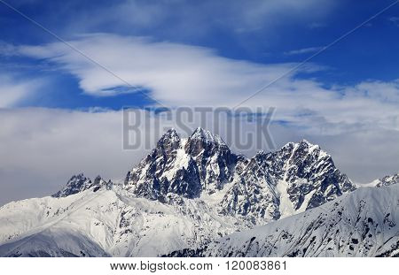 Mounts Ushba And Chatyn And Blue Sky With Clouds