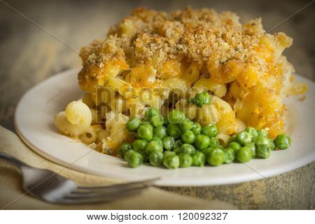 Home made baked macaroni and cheese with crispy bread crum topping