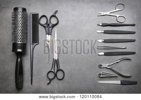 Barber and manicure set on grey background