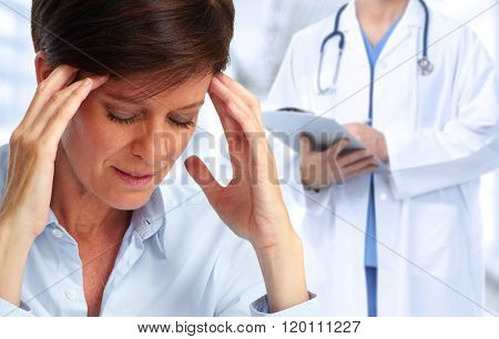 Woman having a migraine headache.