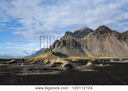 Mountains And Volcanic Lava Sand In Stokksness, Iceland