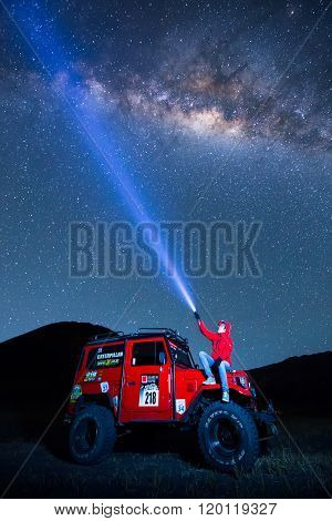 Bromo, Indonesia - June 22 : 4X4 Jeep For Rent With Traveller Among The Milky Way Over The Bromo Vol