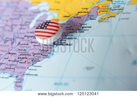 Pin With Plastic Flag Inserted In Map Of Usa