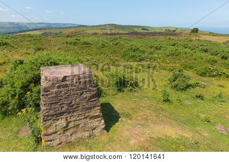 Trig Point on North Hill near Minehead UK with beautiful Somerset countryside in the west of England