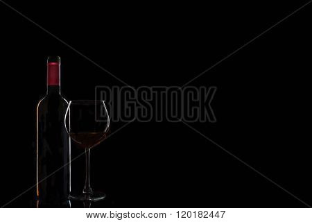 Wine bottle with a glass