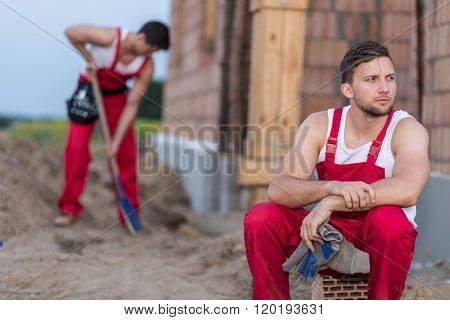Tired Construction Worker Resting
