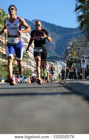 Two Runners From Different Teams