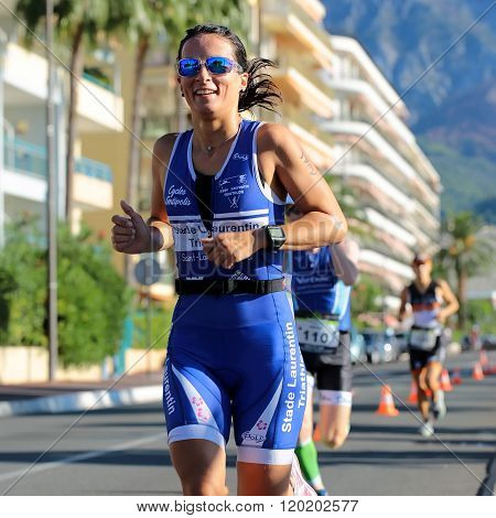 Woman Runner In Blue Suit