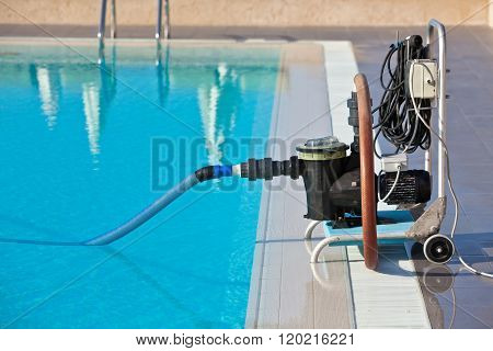 Cleaning Pump Working With A Swimming Pool