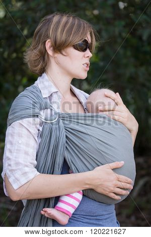 Mother with sleeping baby