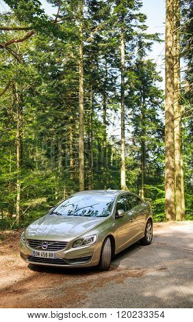 Electric Volvo Limousine In Forest