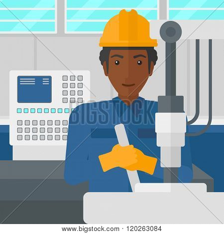 Man working with industrial equipment.