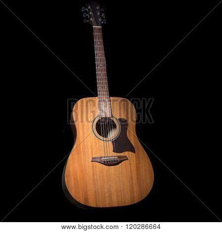 Acoustic Guitar Over Black Background