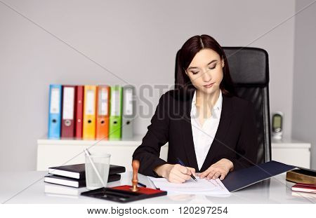 Woman Notary Public Notarizes The Document