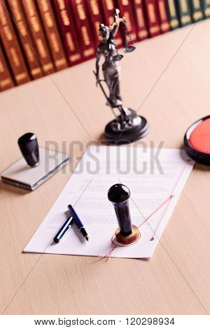 The Document Waiting For The Signature Of A Notary.