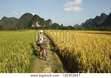 Girl Cycling in China country