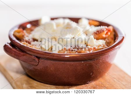 penne in a pan to forn