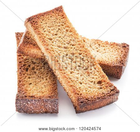 Bread croutons isolated on a white background.