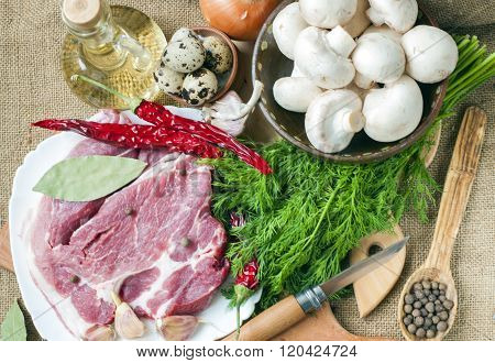 Fresh Meat With Mushrooms Spices And Herbs.