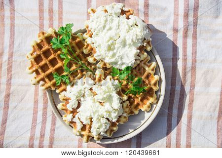 Homemade waffles with cheese and herbs