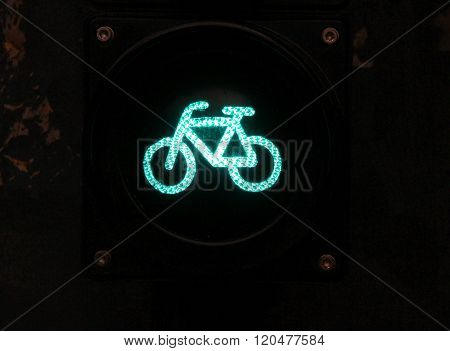 Green Colored Traffic Light With Bike Sign For Cyclists Close Up