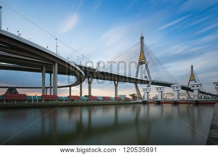 Twin suspension waterfront with moving blue sky cloud