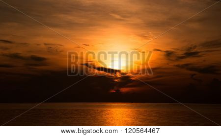 Sunset on sea. Bright sun on sky. beach landscape