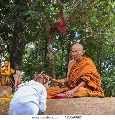 Chanthaburi, Thailand - March 5, 2016: The Monk in Wat Khao Khitchakut Phawanaram, Chanthaburi Province, Thailand