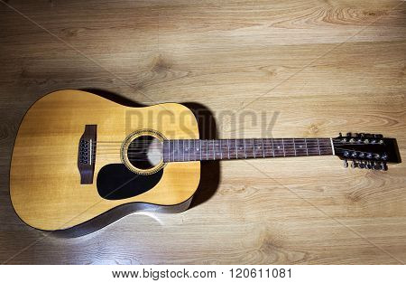 Yellow Acoustic 12-strings Guitar