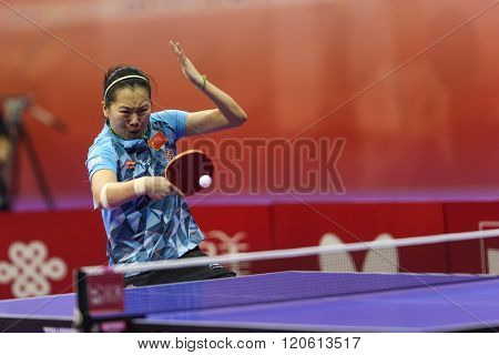 KUALA LUMPUR, MALAYSIA - MARCH 01, 2016: Li Xiaoxia of China plays return shot in her match in the Perfect 2016 World Team Table-tennis Championships held in Kuala Lumpur, Malaysia.