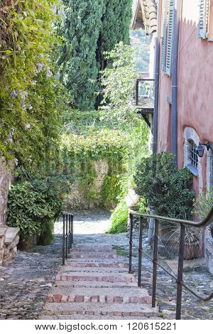 Walkway in narrow alleyway  in old French town