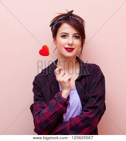 Portrait Of A Young Woman With Toy