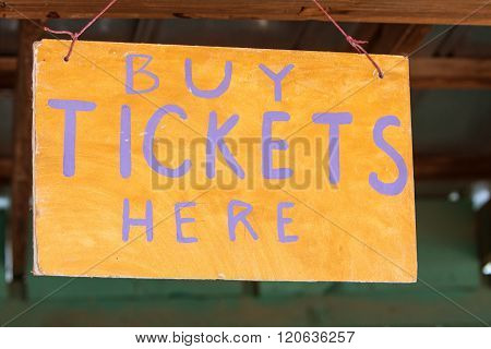 Handmade Sign Instructs Carnival Patrons Where To Buy Tickets