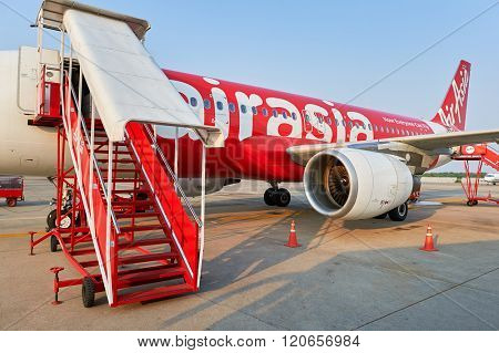 PATTAYA, THAILAND - FEBRUARY 17, 2016: Thai AirAsia A320 in U-Tapao - Pattaya International Airport. Thai AirAsia is a joint venture of Malaysian low-fare airline AirAsia and Thailand's Asia Aviation