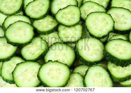 Fresh Cucumbers As  Background..