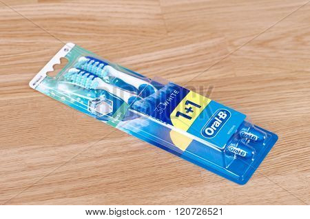 SARANSK, RUSSIA - CIRCA, 2016: Oral-b toothbrush on a wooden table.