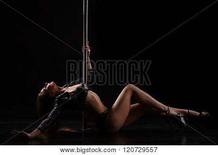 Dancing for adults. Image of sexy pole dancer