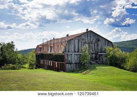 Old barn, La Malbaie, Quebec Province, Canada. Image take from public road.