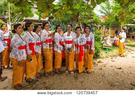 SANUR, BALI - MAR 18, 2016: Unidentified local people during Melasti Ritual. Melasti is a Hindu Balinese purification ceremony and ritual is held several days prior to the Nyepi holy day.