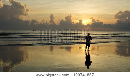Fisherman With Rod at Sunset