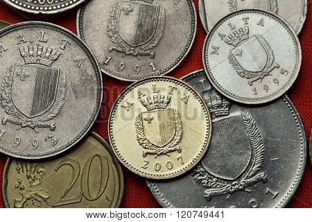 Coins of Malta. Coat of arms of Malta depicted in the Maltese lira coins. 