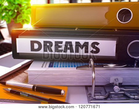 Dreams on Black Office Folder. Toned Image.