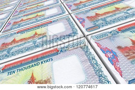 Myanmar kyat bills stacked background. Computer generated 3D photo rendering.