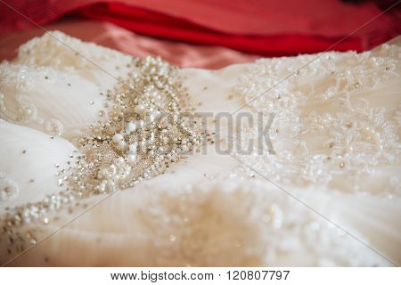 Wedding dress waiting bride. Exquisite lace details.
** Note: Shallow depth of field