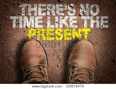 Top View of Boot on the trail with the text: Theres No Time Like the Present