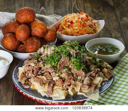 National Kazakh Dishes: Beshbarmak, Salad Of Radish Shalgam, And Baursak.