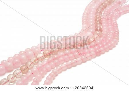 Strings of pink quartz