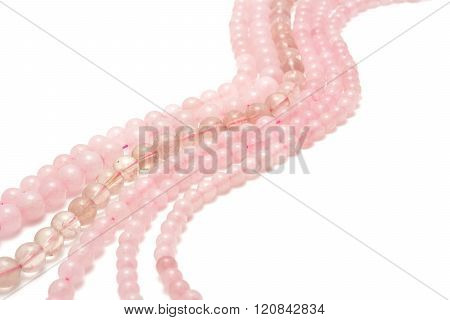 Strings of pink quartz