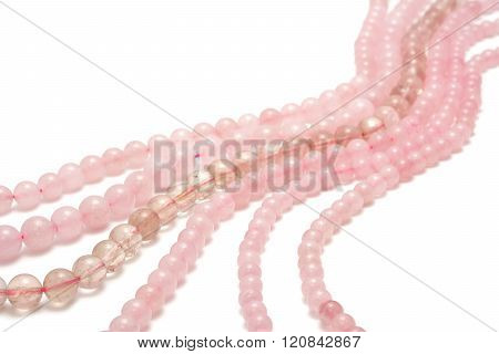 Strings of pink quartz