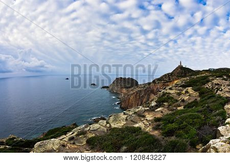 Lighthouse at Capo Sandalo on west coast of San Pietro island, Sardinia
